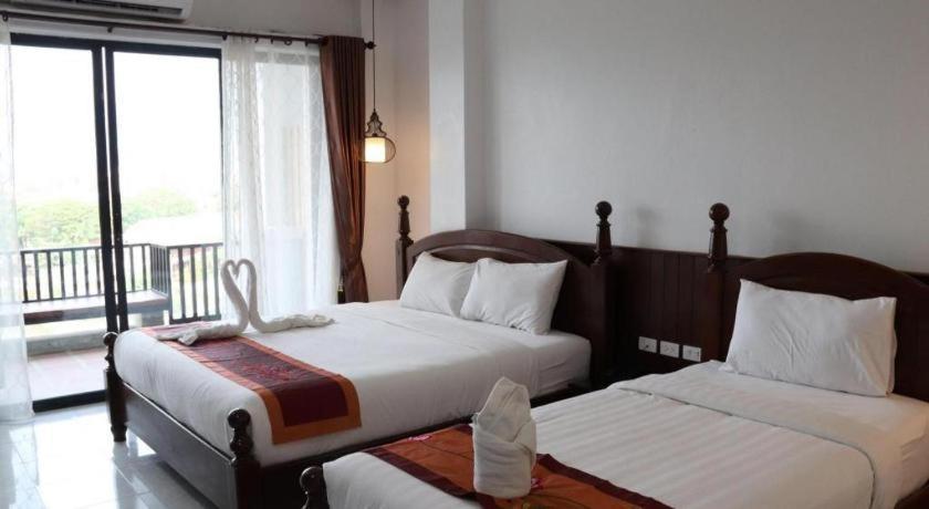 Thavisouk Riverside Hotel Vang Vieng Exterior photo