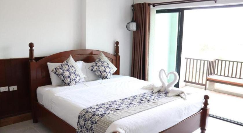 Thavisouk Riverside Hotel Vang Vieng Exterior photo