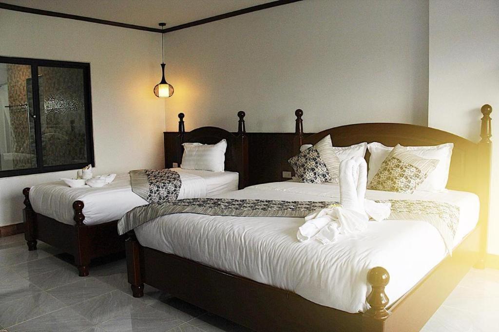 Thavisouk Riverside Hotel Vang Vieng Exterior photo